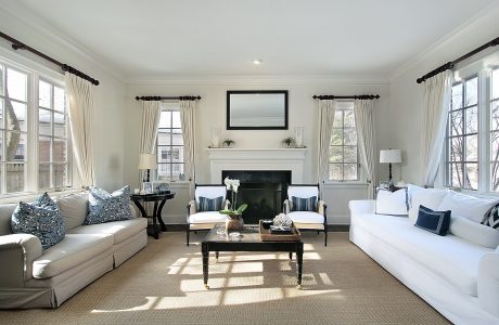 Living room in luxury home with fireplace