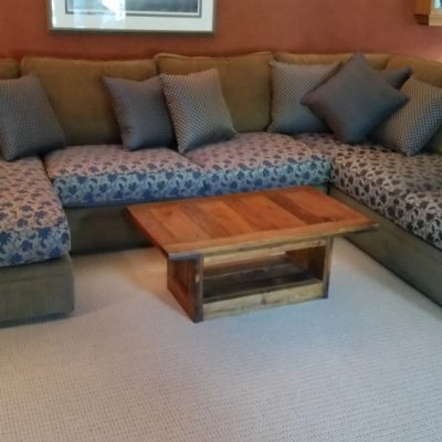Reupholstered cushions on sectional sofa