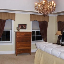 Master bedroom shaped cornices and draperies