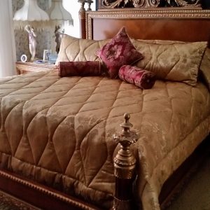 custom king size quilted comforter in a diamond pattern with 2 quilted king shams, 2 bolster billows and 1 knife edge pillow with button center