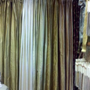 Display showing different styles of draperies.