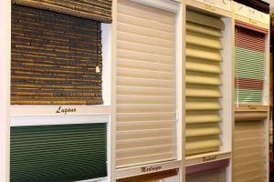 N J Rose showroom: window blind display, Lugano, Marinique, Rembrandt…