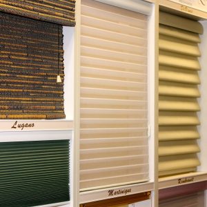 N J Rose Showroom store display showcasing different window blind styles that are available.