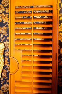 Custom stained wood plantation shutters.