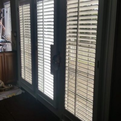 Plantation shutters cover doors in Pottstown, PA home