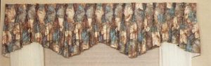 multiple arch tapered pinch pleat valance.